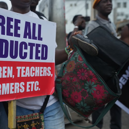 FILE - People protest demanding government to rescue the school children that were recently kidnapped in various part of the country, on the street of Lagos, Nigeria, Friday, June 12, 2026. (AP Photo/Sunday Alamba, File)