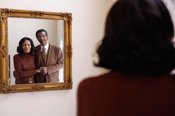 (Left to right) Betty and Glenn Madison pose for a portrait at their home in MCDonough on Thursday, Feb. 12, 2026. The couple met in 1957 and have been married for 65 years. (Natrice Miller/AJC)