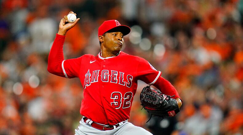 Relief pitcher Raisel Iglesias, traded by the Los Angeles Angels to the Braves on Tuesday, throws a pitch in a game against  the Baltimore Orioles on July 8, 2022, in Baltimore. (AP Photo/Julio Cortez)