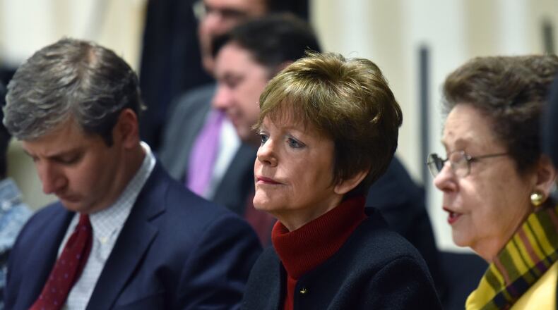 Former mayoral candidate Mary Norwood watches as workers recount the votes cast in the Atlanta mayoral election runoff at the Fulton County Elections Preparation Center on Thursday. HYOSUB SHIN / HSHIN@AJC.COM