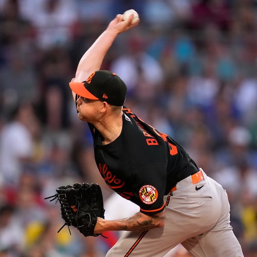 Baltimore Orioles starting pitcher Kyle Bradish delivers in the first inning during the second baseball game of a doubleheader against the Boston Red Sox, Wednesday, July 22, 2026, in Boston. (AP Photo/Charles Krupa)