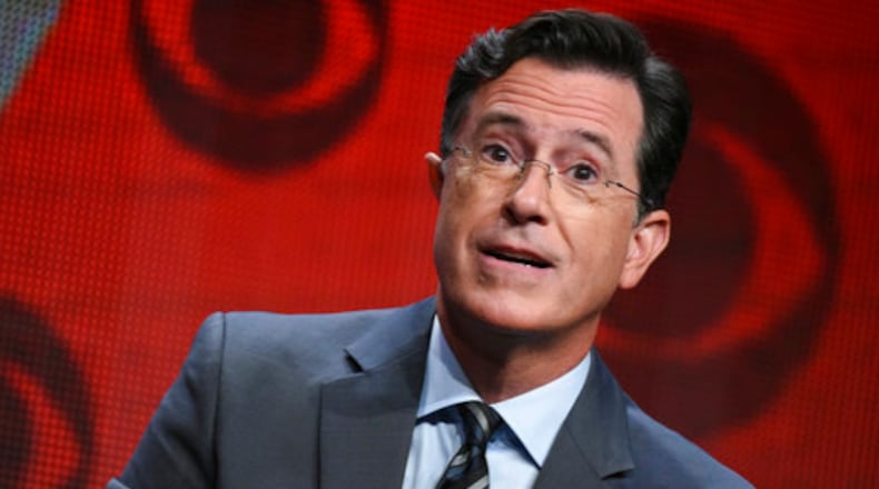 FILE - In this Aug. 10, 2015, file photo, Stephen Colbert participates in "The Late Show with Stephen Colbert" segment of the CBS Summer TCA Tour in Beverly Hills, Calif. Colbert says he has no regrets about insulting President Donald Trump in a monologue that included a crude sexual reference and prompted calls to fire him and boycott âLate Showâ advertisers. In his Wednesday, May 3, 2017, monologue, Colbert says he would change âa few words that were cruder than they needed to beâ but heâd still do it again. (Photo by Richard Shotwell/Invision/AP, File)