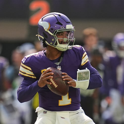 Minnesota Vikings quarterback Kyler Murray drops back to pass during the first half of an NFL football game against the Green Bay Packers Sunday, Sept. 13, 2026, in Minneapolis, Minn. (AP Photo/Abbie Parr)