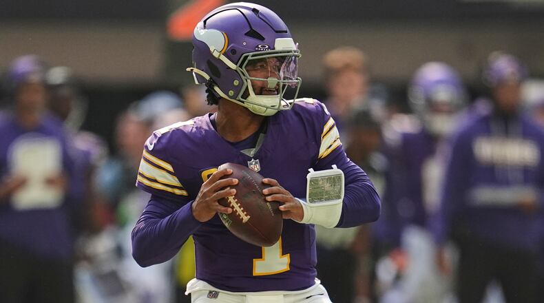 Minnesota Vikings quarterback Kyler Murray drops back to pass during the first half of an NFL football game against the Green Bay Packers Sunday, Sept. 13, 2026, in Minneapolis, Minn. (AP Photo/Abbie Parr)