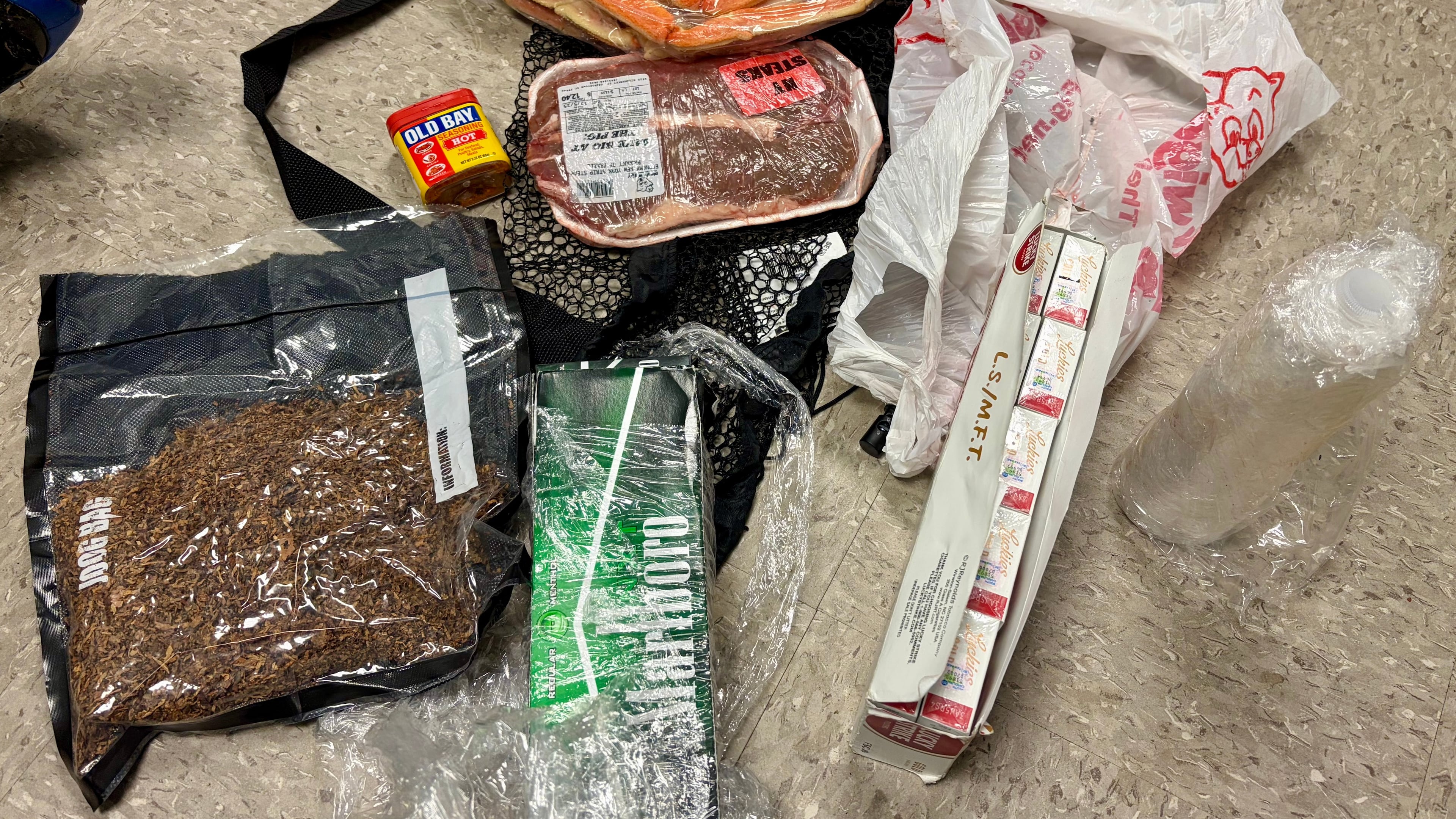 In this undated photo released by the South Carolina Department of Corrections, items dropped by a drone into the Lee Correctional Institution in Bishopville, S.C., are seen. (South Carolina Department of Corrections via AP)