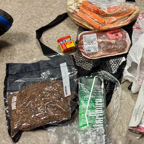 In this undated photo released by the South Carolina Department of Corrections, items dropped by a drone into the Lee Correctional Institution in Bishopville, S.C., are seen. (South Carolina Department of Corrections via AP)