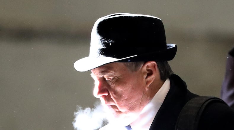 Head coach Bill Belichick of the New England Patriots arrives with his teammates for Super Bowl LII on January 29, 2018 at the Minneapolis-St. Paul International Airport in Minneapolis, Minnesota. (Photo by Elsa/Getty Images)