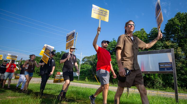 Teamster members of UPS participate in a practice picketing in Griffin on Saturday, July 8, 2023. They are preparing to go on strike August 1st if a contract agreement isn’t reached for facilities around the country. (Katelyn Myrick/katelyn.myrick@ajc.com)