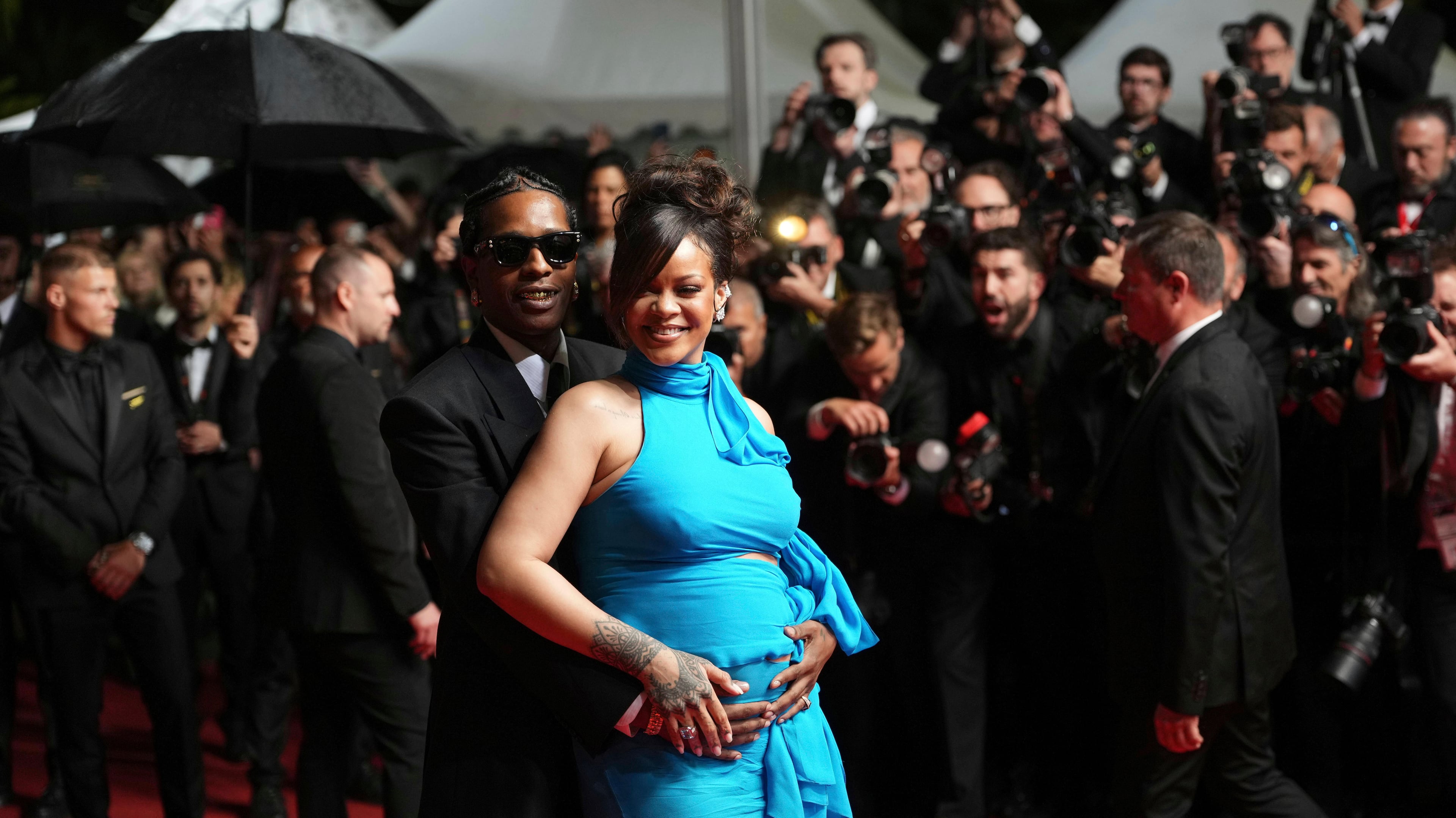 FILE - A$AP Rocky, left, and Rihanna pose for photographers upon departure from the premiere of the film 'Highest 2 Lowest' at the 78th international film festival, Cannes, southern France, Monday, May 19, 2025. (Photo by Lewis Joly/Invision/AP, File)