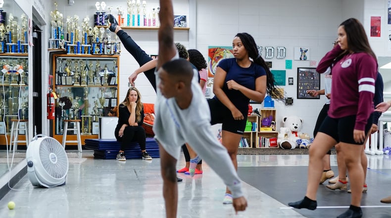 Teacher Melissa Colon, seated, watches as students practice a dance routine at Babb Middle School on Monday, October 21, 2019, in Forest Park. ELIJAH NOUVELAGE/SPECIAL TO THE ATLANTA JOURNAL-CONSTITUTION