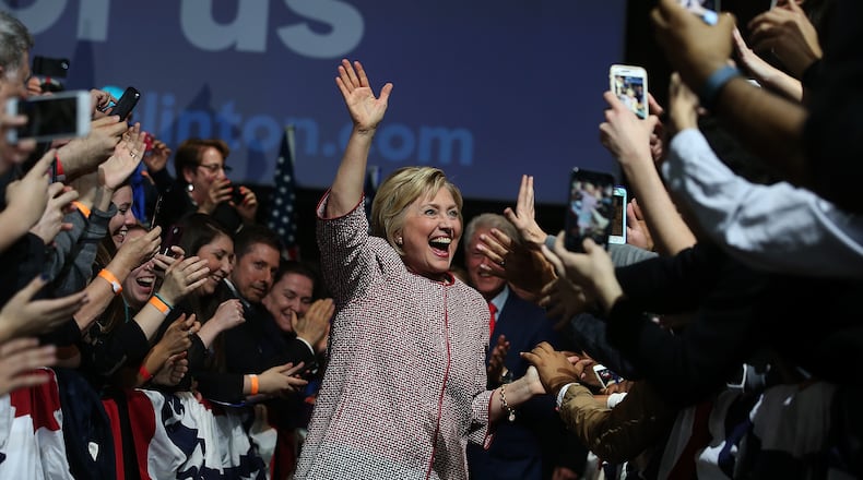 NEW YORK, NY - APRIL 19: Democratic presidential candidate former Secretary of State Hillary Clinton greets supporters during a primary election night gathering on April 19, 2016 in New York City. Hillary Clinton defeated democratic rival U.S. Sen. Bernie Sanders in the New York presidential primary. She appears to be wearing a Georgio Armani jacket that costs $12,495. (Photo by Justin Sullivan/Getty Images)