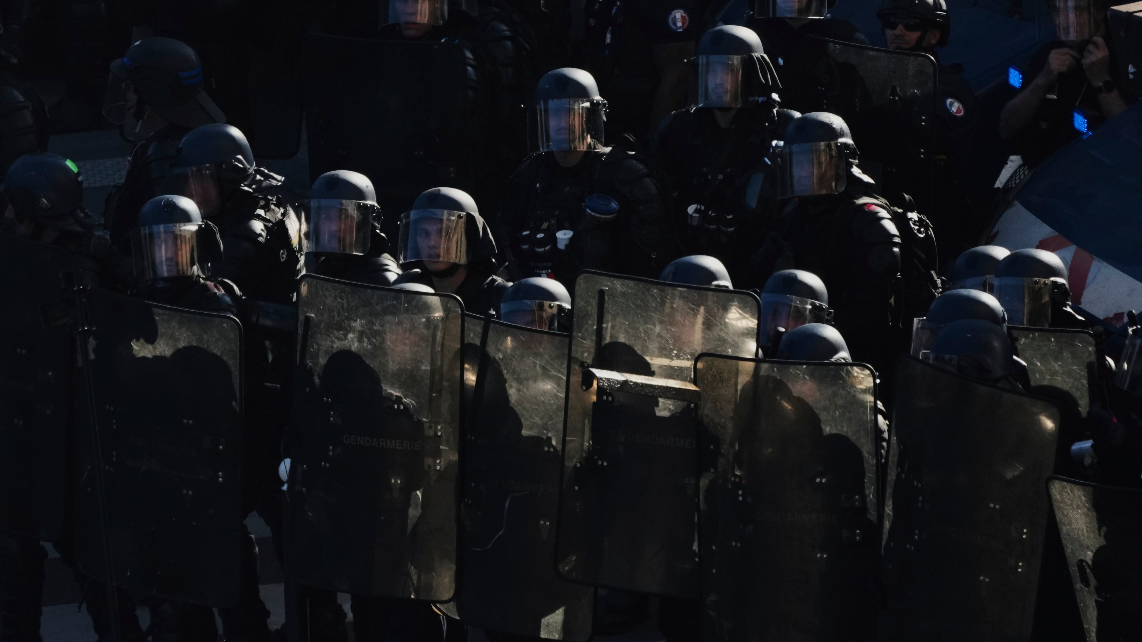 Police officers stand guard during a demonstration called by major trade unions to oppose budget cuts, in Paris, France, Thursday, Sept. 18, 2025. (AP Photo/Aurelien Morissard)
