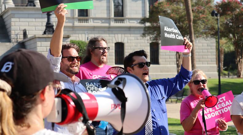 FILE - Over two dozen abortion rights supporters attend a rally outside the South Carolina State House in Columbia, S.C., on Aug. 23, 2023. (AP Photo/James Pollard, file)