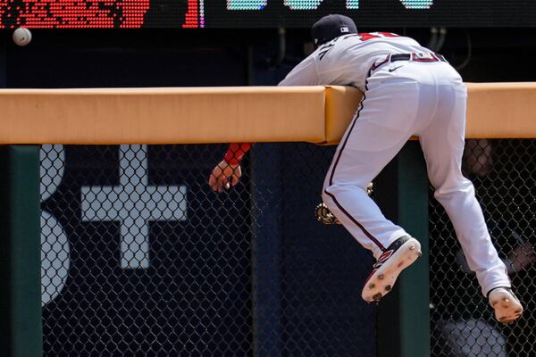 Bottoms up. (Mike Stewart/AP)