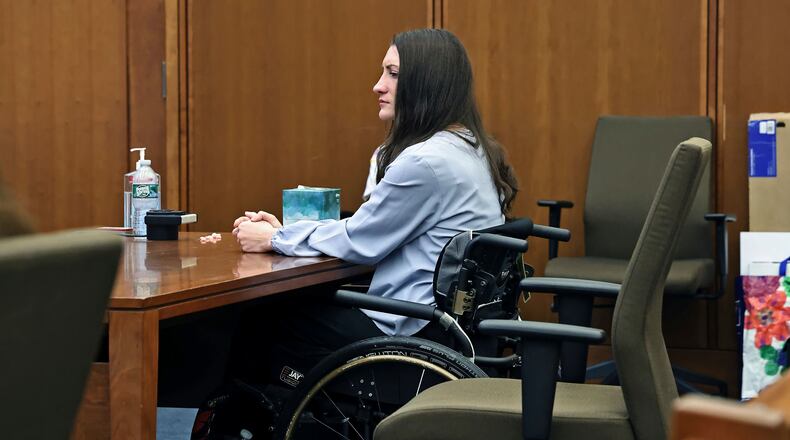 Lindsay Clancy sits at the defense table as Kevin Reddington asks the jury to find her not guilty during her murder trial at Plymouth Superior Court in Plymouth, Mass., Thursday, Aug. 27, 2026. (Greg Derr/The Patriot Ledger via AP, Pool)