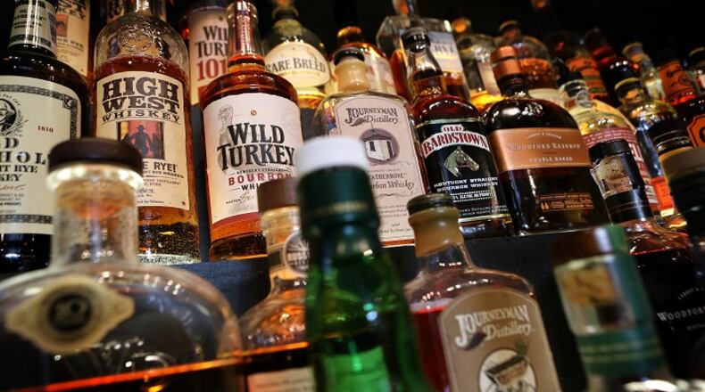 The shelves at Gamlin Whiskey House in the Central West End of St. Louis are stocked with hundreds of bottles of whiskey on Thursday, Sept. 15, 2016. (David Carson/St. Louis Post-Dispatch/TNS)