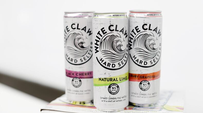 The popularity of White Claw Hard Seltzers is challenging beer brands even as established as Budweiser. KRISTEN NORMAN / CHICAGO TRIBUNE / TNS