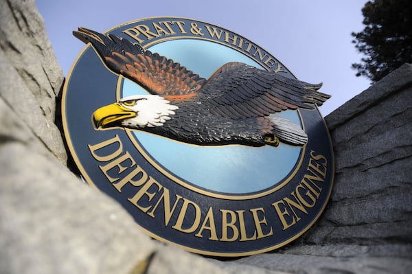 FILE - This file photo taken Feb. 5, 2010, shows a "Pratt & Whitney Dependable Engines" emblem at the plant in East Hartford, Conn. (AP Photo/Jessica Hil, filel)