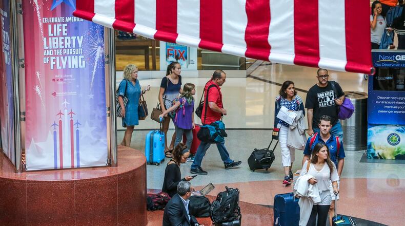 June 30, 2017 Hartsfield-Jackson International Airport: Travelers were bustling through Hartsfield-Jackson International Airport Friday, June 30, 2017 on what is expected to be a record-setting day for passenger counts. Hartsfield-Jackson expected more than 90,000 travelers to pass through its checkpoints throughout the Friday, surpassing the previous record set over the Memorial Day travel period. Security officials warn travelers that fireworks are prohibited in both carry-on and checked baggage, and cannot be brought onto an airliner. Prohibited fireworks include aerial repeater and aerial shell fireworks, bottle rockets, chasers, firecrackers, flying spinners, fountains, ground spinners, missiles, parachute fireworks, poppers, Roman candles, skyrockets, smoke fireworks, snakes, snaps, sparklers, strobes and wheels, according to the federal Transportation Security Administration. Those items are flammable, made from explosive materials and are considered hazardous, TSA says. JOHN SPINK/JSPINK@AJC.COM.