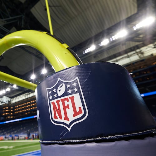 FILE - In this Aug. 13, 2021, file photo, an NFL logo is displayed on a goal post pad during an NFL preseason football game between the Buffalo Bills and Detroit Lions in Detroit. (AP Photo/Rick Osentoski, File)