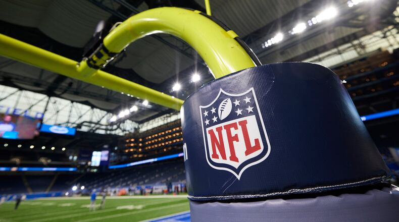 FILE - In this Aug. 13, 2021, file photo, an NFL logo is displayed on a goal post pad during an NFL preseason football game between the Buffalo Bills and Detroit Lions in Detroit. (AP Photo/Rick Osentoski, File)