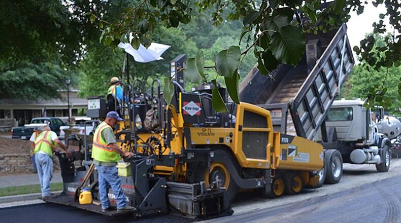 Cherokee County will make asphalt repairs to Baxter Avenue at Reinhardt University and be reimbursed by the college. AJC FILE