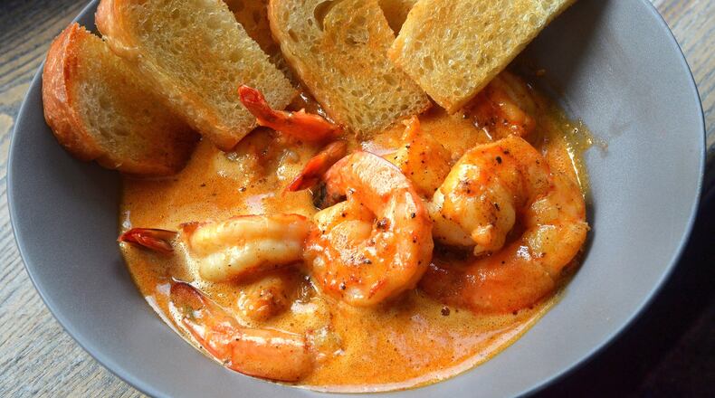 Shrimp Sauteed in BBQ Butter. Recipes are for New Orleans-style preparations for fish and seafood by chef Tenney Flynn, who lives in New Orleans, but who was born and raised in Stone Mountain, Georgia, and got his start with the Buckhead Life Restaurant Group. He has a new book out on fish and seafood, which is where the recipes come from. All photos taken Friday July 26, 2019 at Kyma in Buckhead. Food styling by Tenney Flynn. (Chris Hunt Photography)