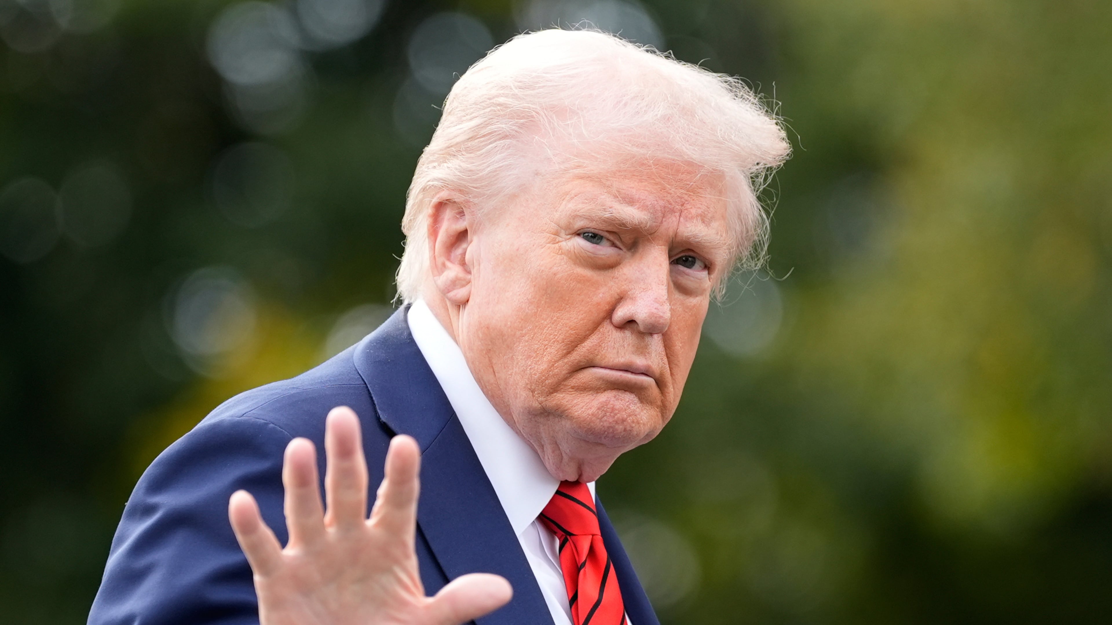 President Donald Trump walks on the South Lawn after arriving on Marine One at the White House, Friday, Oct. 10, 2025, in Washington. (AP Photo/Alex Brandon)