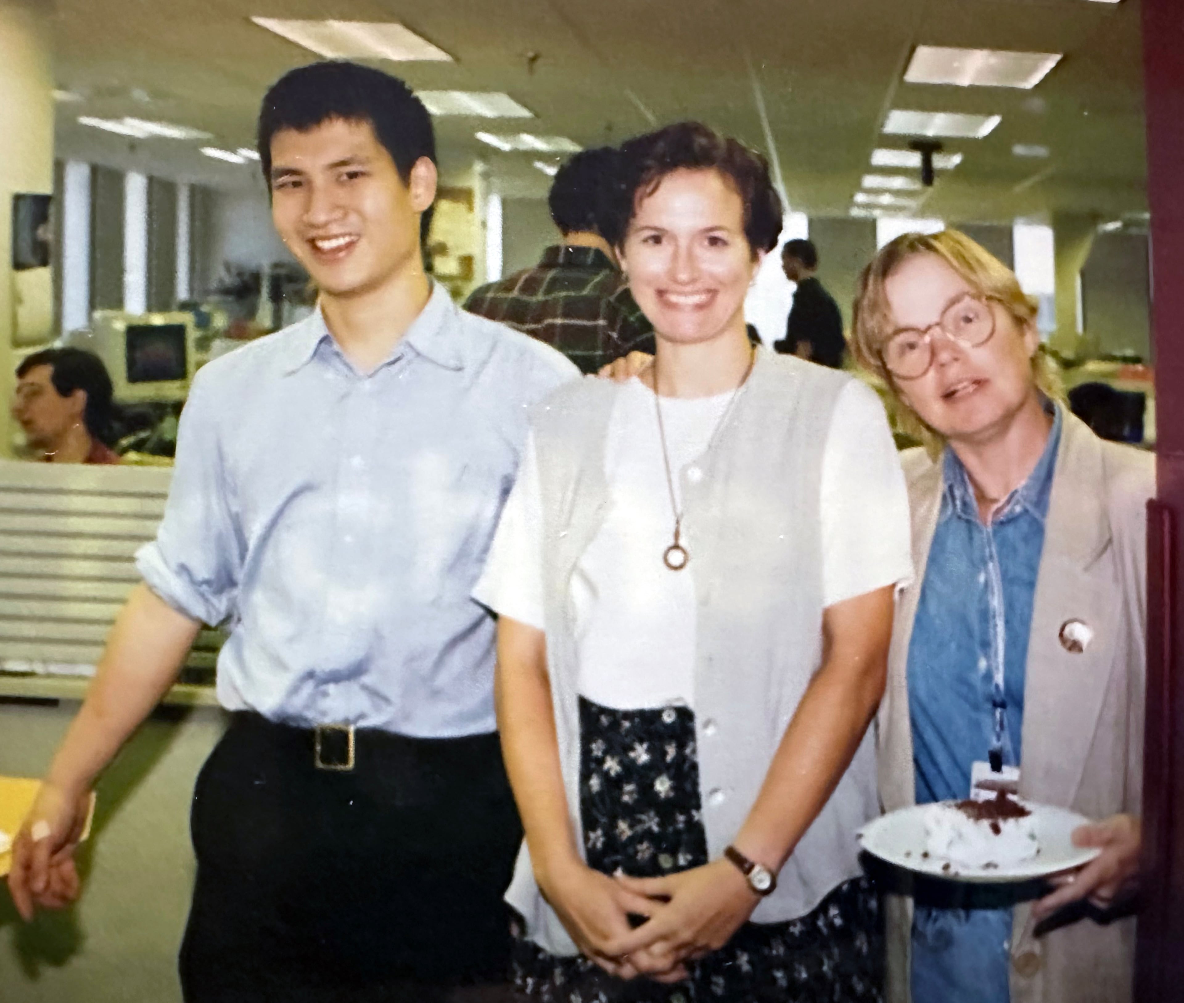 Rodney Ho (left), then 27, with Patti Bond and his former boss Susan Wells before he left The Atlanta Journal-Constitution in 1996 for The Wall Street Journal. He returned in 2001 and has now spent 26 collective years with the AJC. (Courtesy of Rodney Ho)