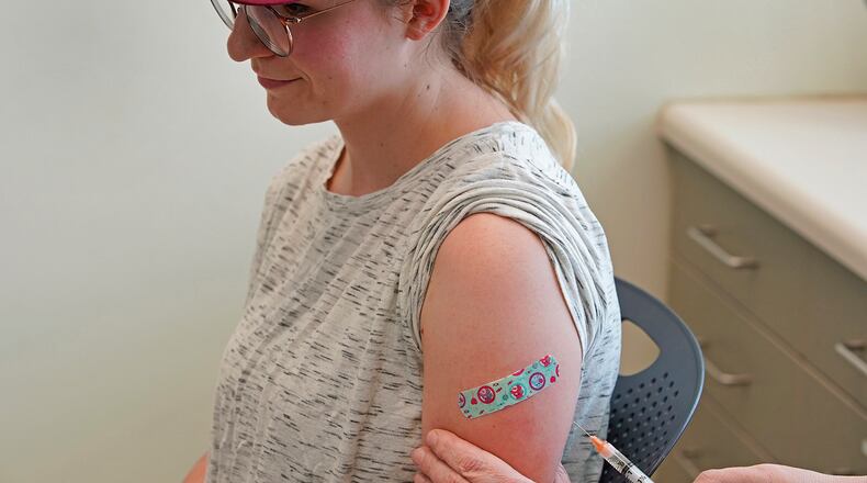 A nurse gives Michaella a measles, mumps and rubella virus vaccine made by Merck at the Utah County Health Department on April 29, 2019, in Provo, Utah. These were Michaella's first ever vaccinations. She asked that only her first name be used. (George Frey/Getty Images/TNS)