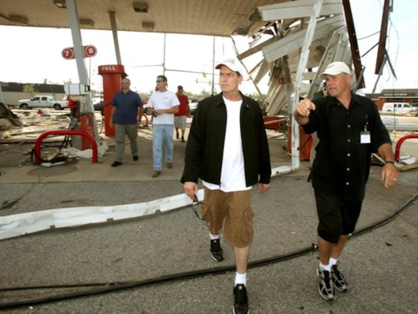 Charlie Sheen tours tornado damage in Alabama