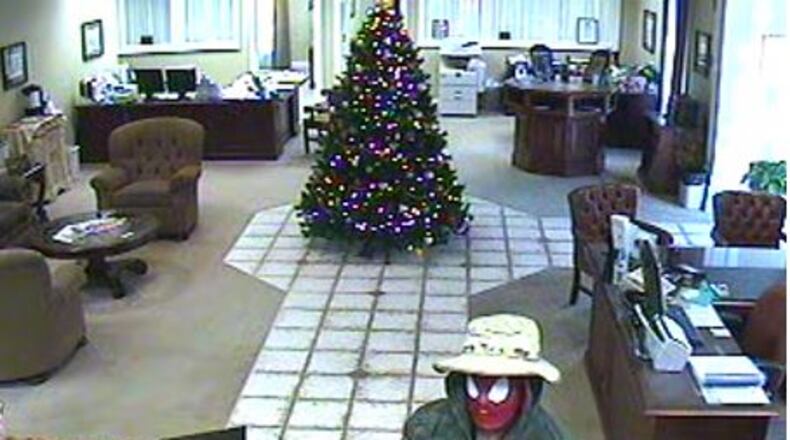 The GBI is seeking the public’s help to identify this robber, who was wearing a Spider-Man mask during a heist at a Cornelia bank on Tuesday, Dec. 22, 2015. (Surveillance)