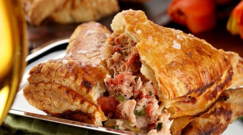 Spicy crab and tomato empanadas are a filling dinner. (Michael Tercha/Chicago Tribune/TNS)