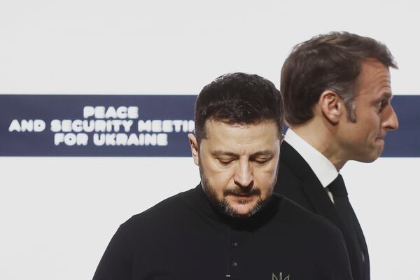 Ukrainian President Volodymyr Zelenskyy, left, andFrench President Emmanuel Macron arrive for a press conferencefollowing a bilateral meeting at the Elysee Palace in Paris, Wednesday, March 26, 2025. (Yoan Valat, Pool via AP)