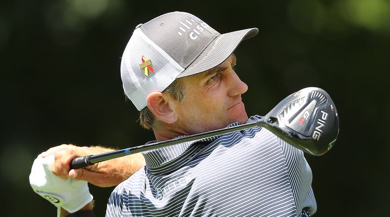 Brendon Todd stares down his tee shot on No. 1 during the second round of the Tour Championship Saturday. “Curtis Compton / Curtis.Compton@ajc.com”