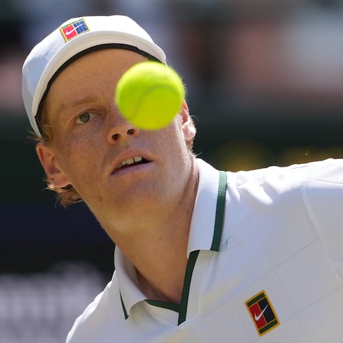 Jannik Sinner of Italy eyes the ball as he prepares to play a forehand against Jan-Lennard Struff of Germany in their quarter-final men's singles match at the Wimbledon Tennis Championships in London, Tuesday, July 7, 2026. (AP Photo/Kin Cheung)