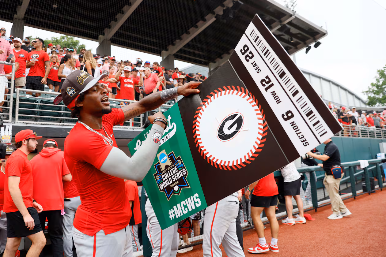 Georgia Bulldogs infielder Tre Phelps (1) reacts as he holds the winning ticket to Omaha College World Series after winning the NCAA Super Regional by defeating the Mississippi State Bulldogs 11-9 in extra innings at Foley Field on Sunday, June 7, 2026, in Athens.
Miguel Martinez/AJC)
