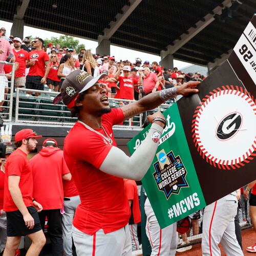 Georgia Bulldogs infielder Tre Phelps (1) reacts as he holds the winning ticket to Omaha College World Series after winning the NCAA Super Regional by defeating the Mississippi State Bulldogs 11-9 in extra innings at Foley Field on Sunday, June 7, 2026, in Athens.
Miguel Martinez/AJC)