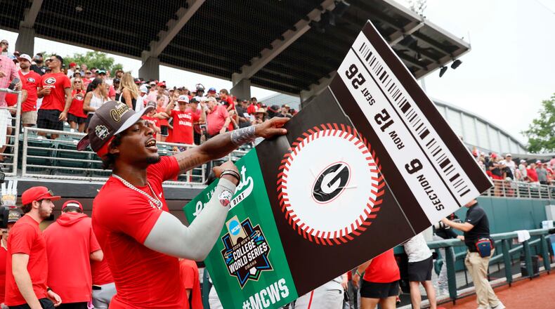 Georgia Bulldogs infielder Tre Phelps (1) reacts as he holds the winning ticket to Omaha College World Series after winning the NCAA Super Regional by defeating the Mississippi State Bulldogs 11-9 in extra innings at Foley Field on Sunday, June 7, 2026, in Athens.
Miguel Martinez/AJC)