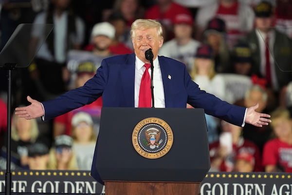 President Donald Trump speaks on his first 100 days at Macomb County Community College Sports Expo Center, Tuesday, April 29, 2025, in Warren, Mich. (AP Photo/Paul Sancya)