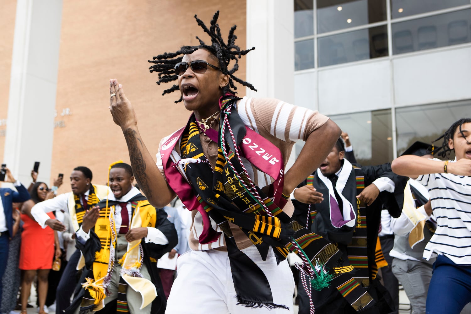 Members of Alpha Phi Alpha fraternity perform a step routine after the Morehouse College commencement ceremony on Sunday, May 21, 2023, on Century Campus in Atlanta. The graduation marked Morehouse College's 139th commencement program. CHRISTINA MATACOTTA FOR THE ATLANTA JOURNAL-CONSTITUTION