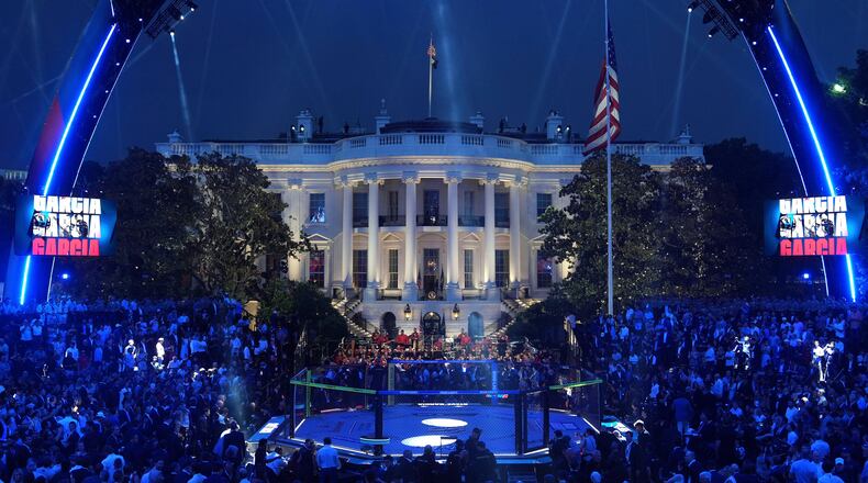 FILE - President Donald Trump arrives at the arena for the UFC Freedom 250 on the South Lawn of the White House, June 14, 2026, in Washington. (AP Photo/Mark Schiefelbein, File)