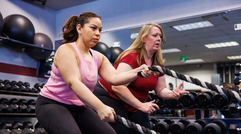 Fitness routines that prioritize strength and consistency can help women adapt to changes that come with midlife. (Dave Cooper/The New York Times 2022)