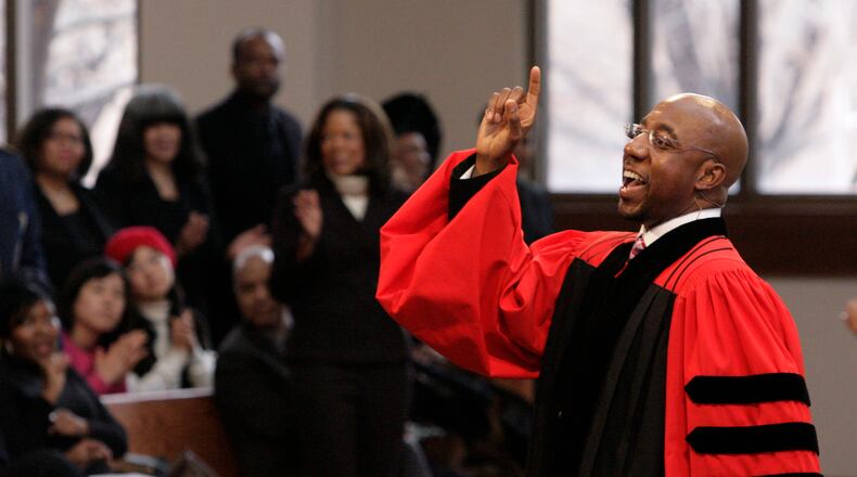 FILE - The Rev. Raphael Warnock delivers a sermon during a church service at Ebenezer Baptist Church in Atlanta on Sunday Jan. 18, 2009. (AP Photo/John Amis, File)