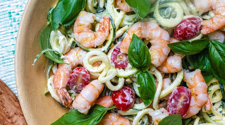 Spiralized zucchini noodles tossed in ranch dressing with grilled shrimp, tomatoes and basil.
(Virginia Willis for The Atlanta Journal-Constitution)