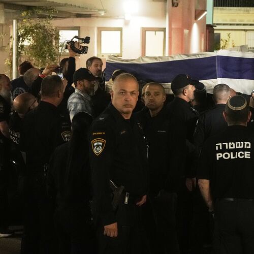 The coffin with remains of Israeli hostage Ran Gvili, last to be recovered from Gaza, arrives to the Abu Kabir Forensic Institute in Tel Aviv, Israel, Monday, Jan. 26, 2026. (AP Photo/Mahmoud Illean)