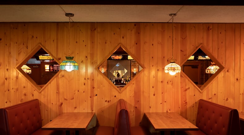 You can feel nice and snug amid Lloyd's walls of knotty pine.