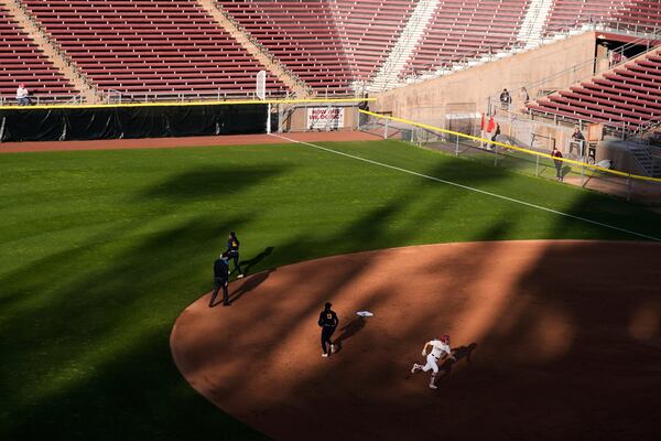 Stanford's Jade Berry, right, runs past second base on her way to score against California on Kyra Chan's double during the first inning of an NCAA college softball game Thursday, April 17, 2025, in Stanford, Calif. (AP Photo/Godofredo A. Vásquez)