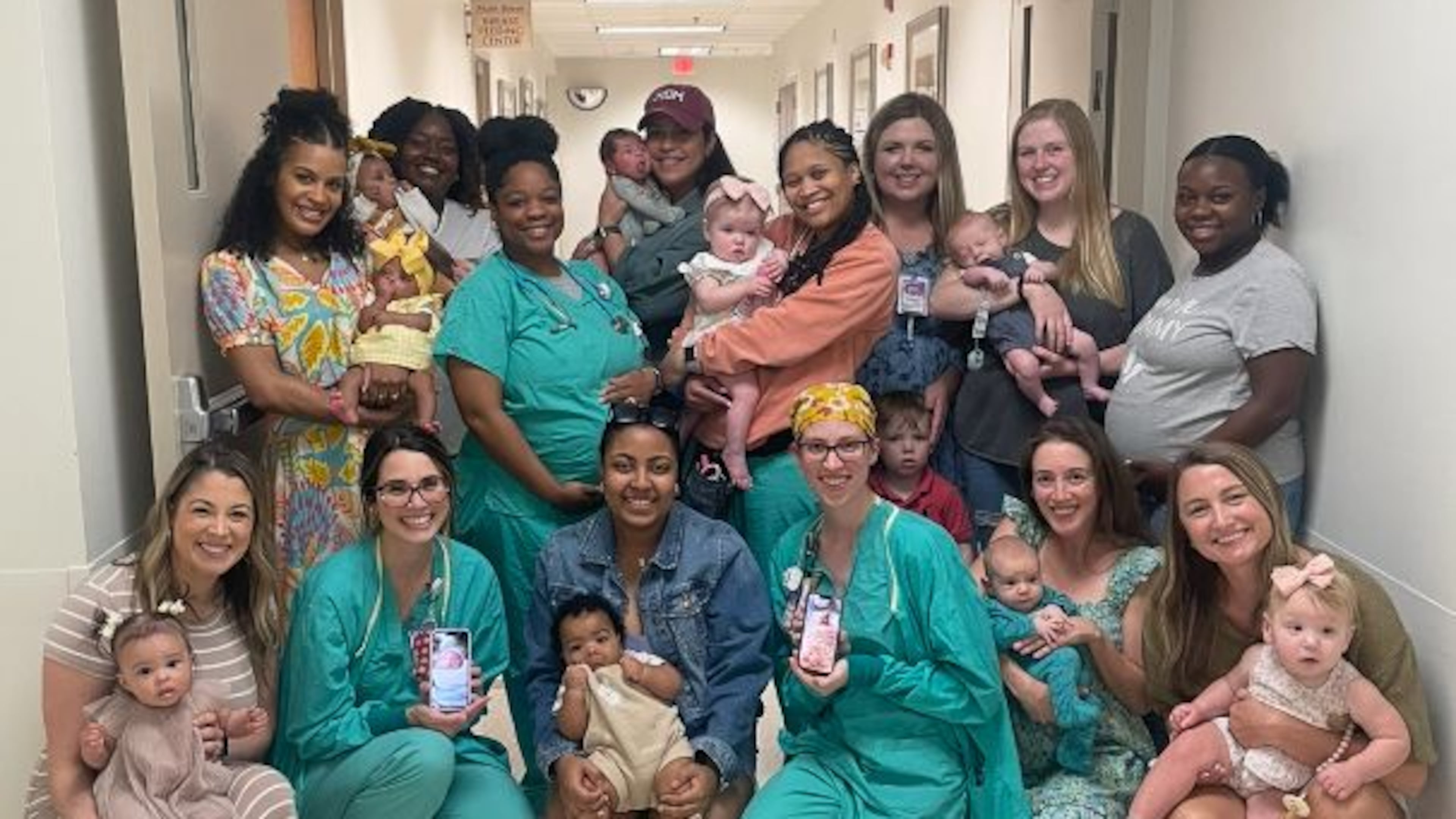 These Wellstar Cobb nurses are also new moms or about to be. Front row, from left: Chailee Beathea, baby Brooklyn, born May 2024; Abigail "Abby" Dann, baby Lily, born May 2024; Cheyenne Hampton, baby Matthew, born November 2024; Mallory Craig, baby Mckenzie, born July 2024; Tess Gallegos, baby August, born April 2025; Shaye Hall, baby Noah, born June 2024. 
Back row, from left: Mauri Lane, baby Londyn, born April 2025; Shannon Teasley, baby Savannah, born December 2024; Candace Sanders, baby Camry, born June 2025; Vera Silberberg, baby Theo, born April 2025; Jamaya Booker, baby Azariah, born February 2025; Hannah Bartlett, baby Ruby, born August 2024; Sabrina Todd, baby Everett, born March 2025; Anna Carter, baby due July 2025.
Not pictured: Riley Pulford, baby Ruthie, born June 2025; Kamilah Plummer, baby Myari, born February 2025; Marissa Konik, due November 2025; Katie Redding, due November 2025. Courtesy of Wellstar Health System