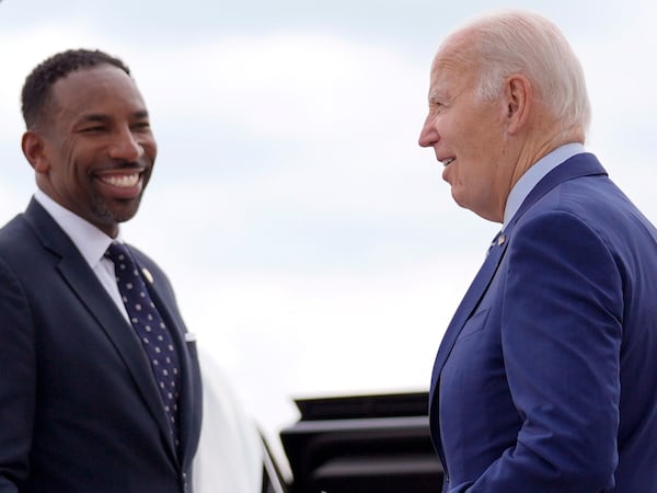 Atlanta Mayor Andre Dickens (left) greeted President Joe Biden at Dobbins Air Reserve Base in Marietta last week.